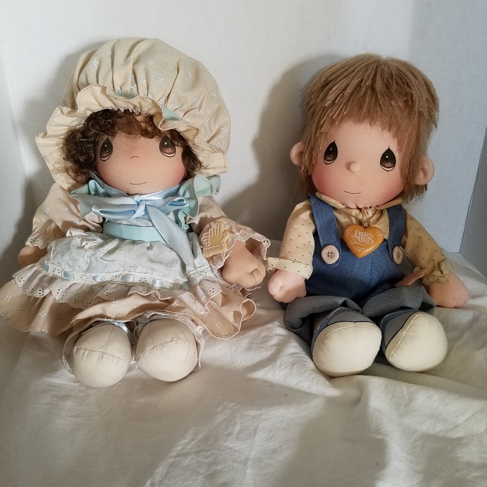 Precious Moments cloth dolls.